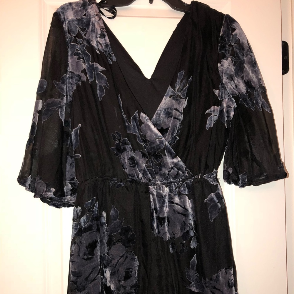Women’s black & blue floral velvet romper Sz Med.